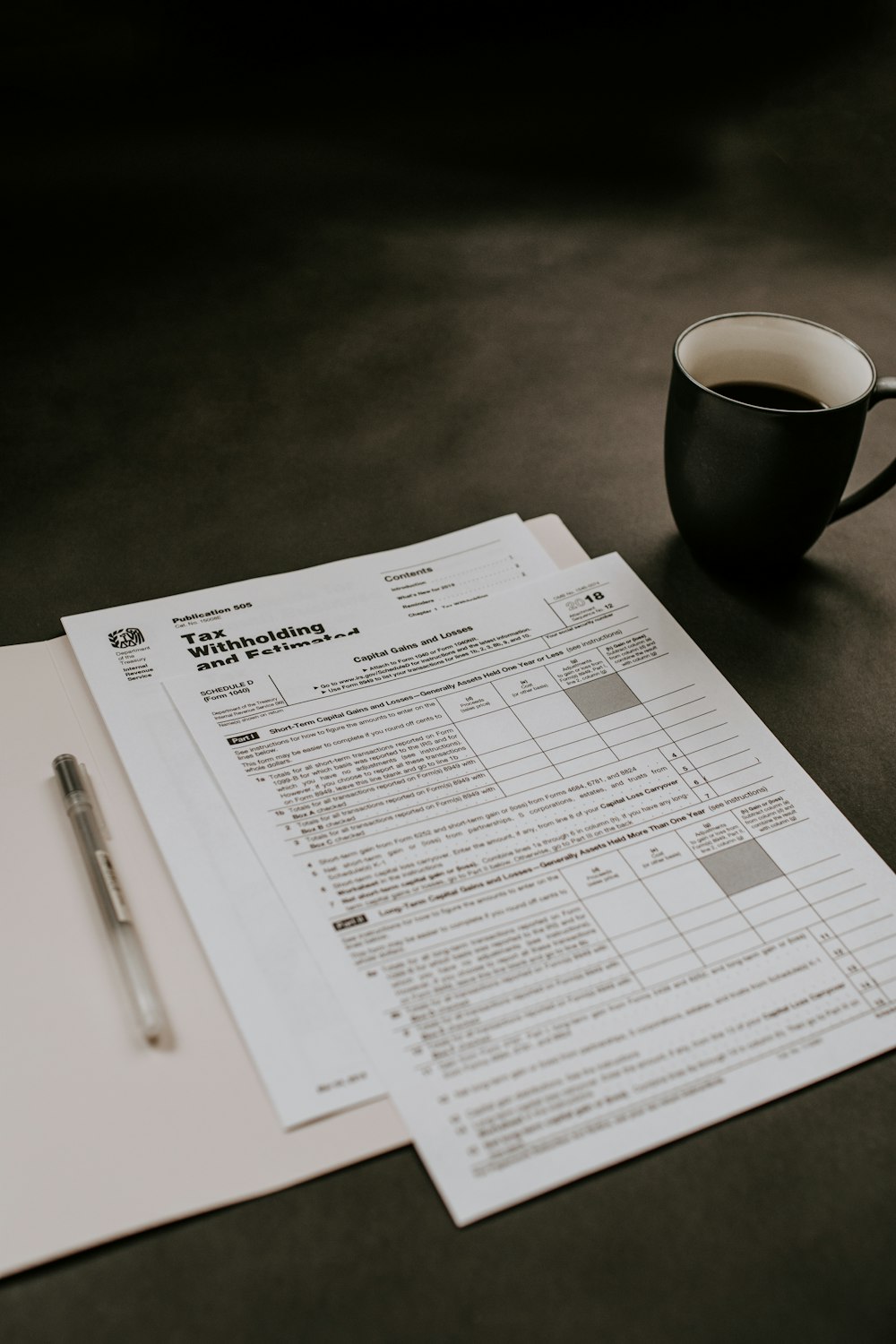 Financial statement and calculator on a desk